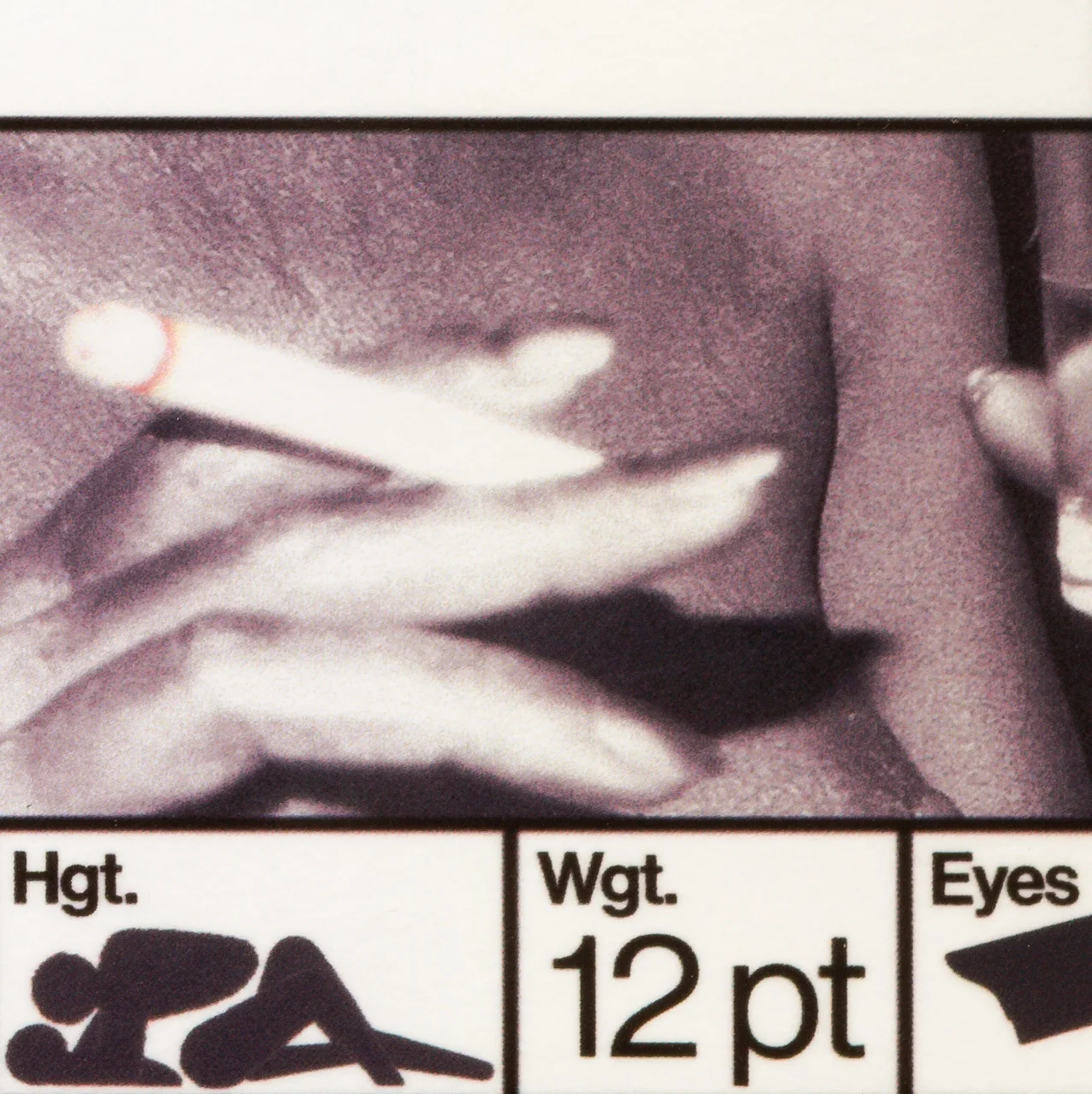 Canon, 2026, by in vivo. Detail: a hand holding a lit cigarette above the Hgt., Wgt. and Eyes fields.