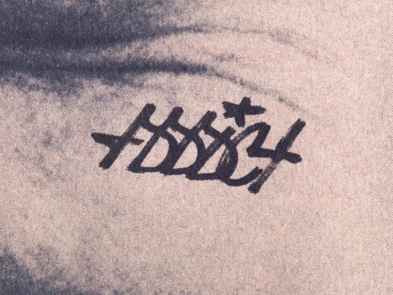 Ephemera, 2025, by in vivo. Detail: the graffiti tag on the cheek.